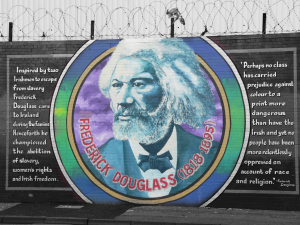 frederick douglass mural on belfast solidarity wall America's influence on Conflict