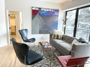 Unit 308 Balcony View with abstract Painting by Robert Kaupelis.